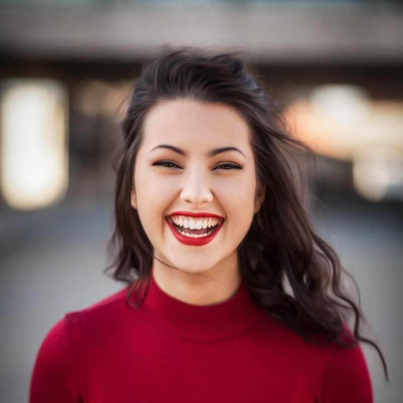 closeup photography of woman smiling